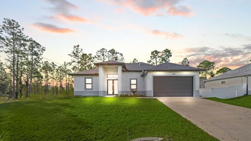 932 Maddock St E, Lehigh Acres, FL 33974