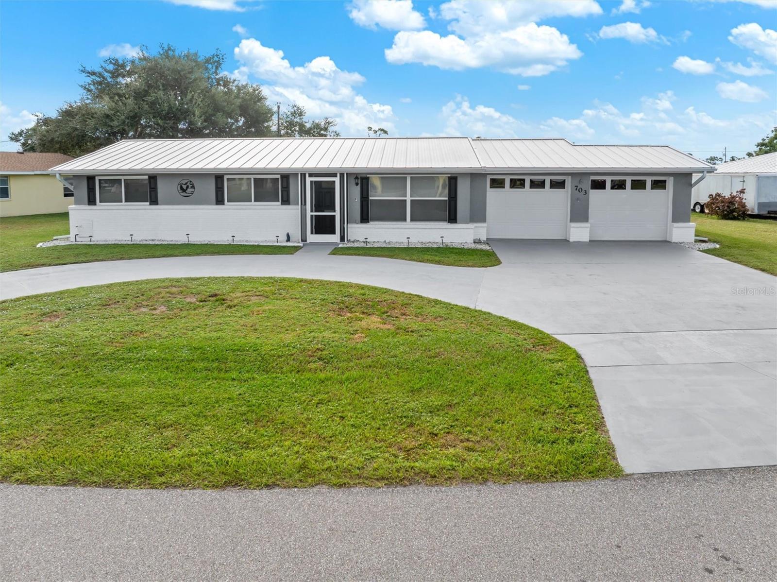 703 Spring Lake Blvd Nw, Port Charlotte, FL 33952