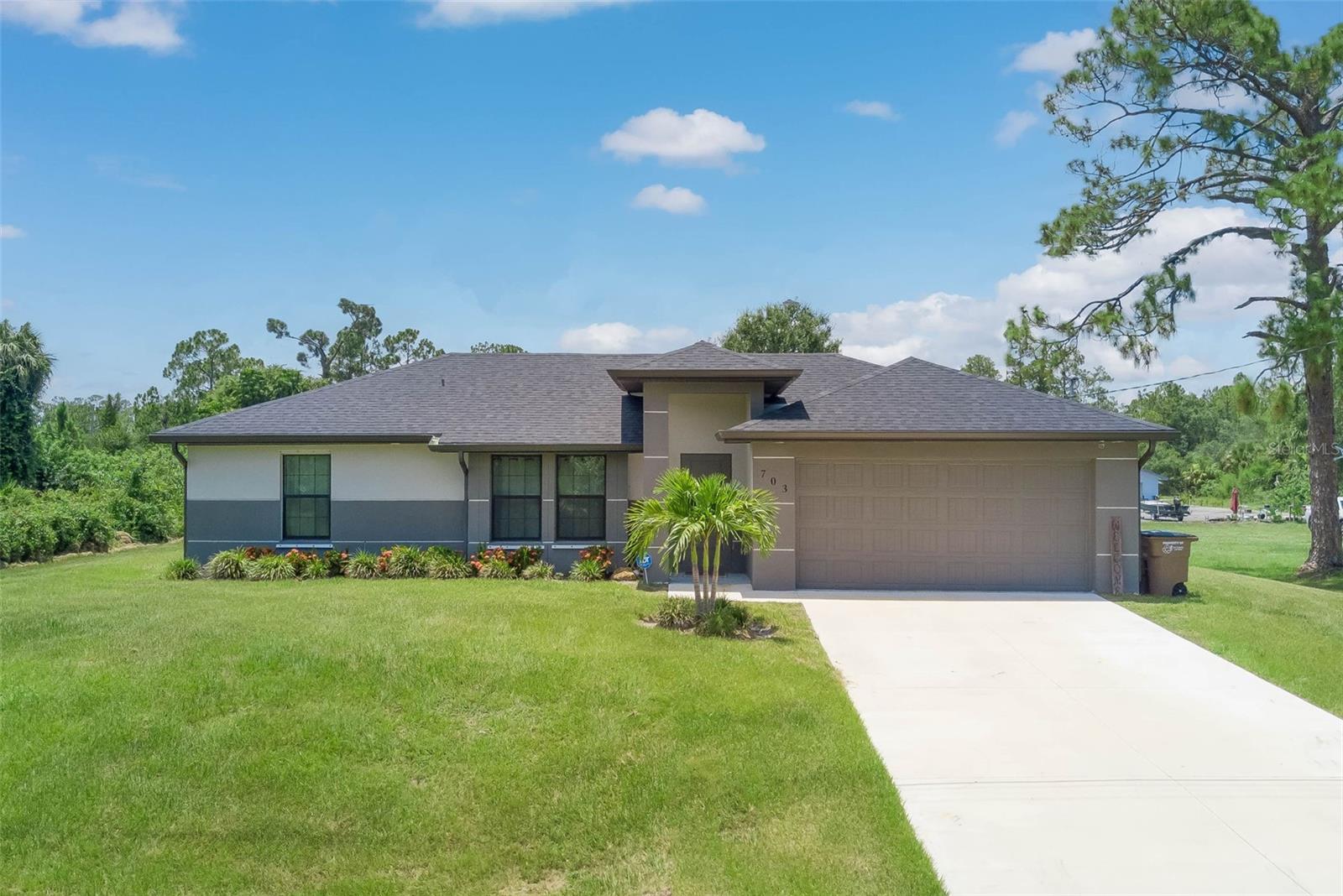 703 Wellington Ave, Lehigh Acres, FL 33972