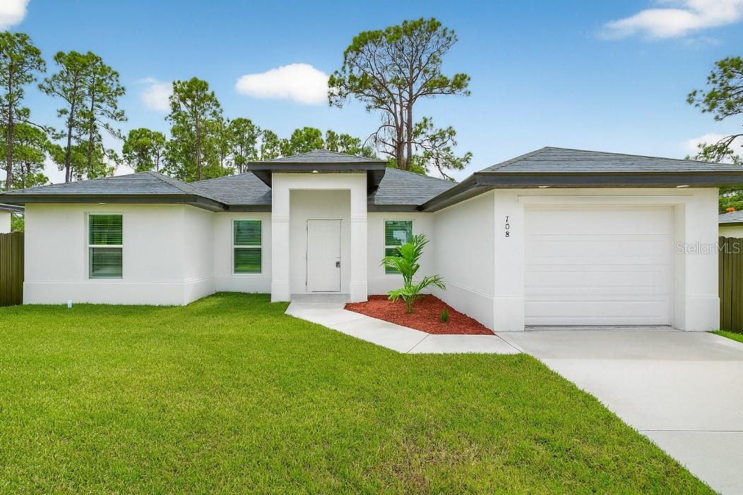 708 Lamar St E, Lehigh Acres, FL 33974