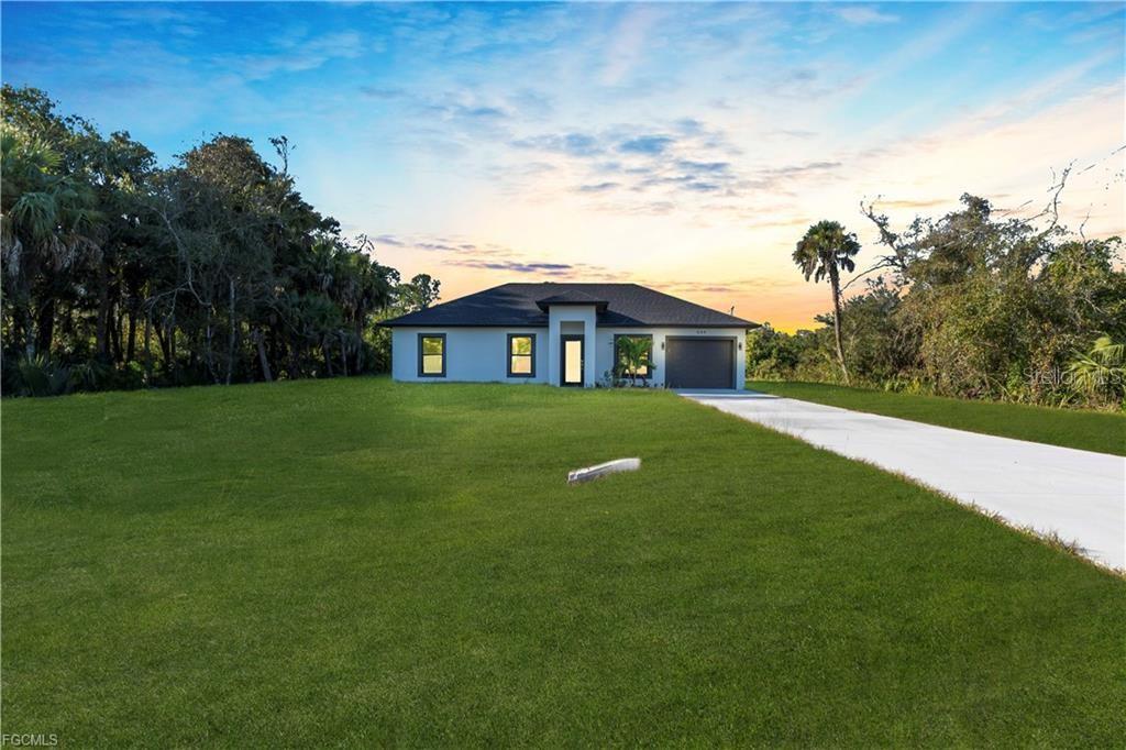 644 Woodcrest Dr, Lehigh Acres, FL 33972